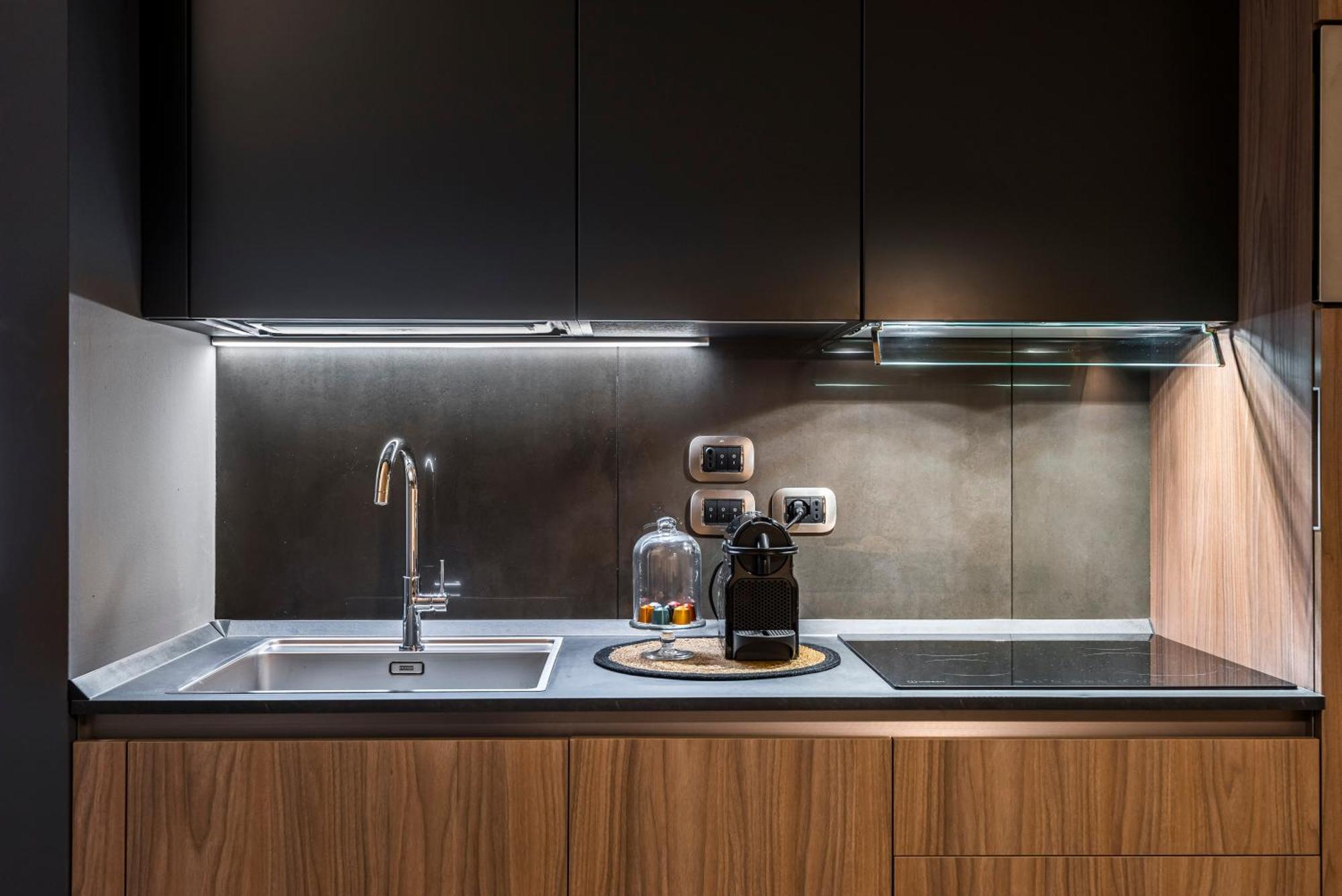 Appartamento Eco Chic With Sofa Bed And Kitchen By Design Club Collection